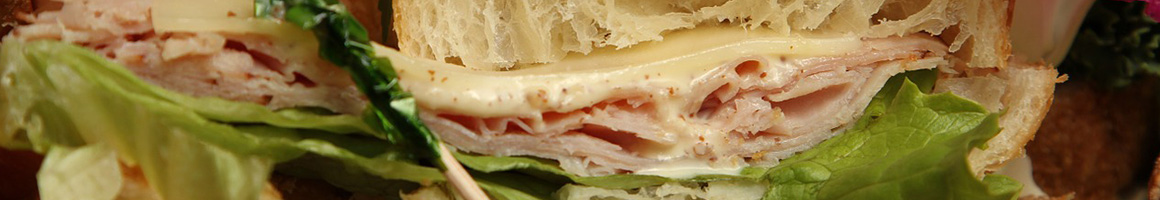 Eating Sandwich at 3 Mundos Sandwich Shop restaurant in Monterey, CA.